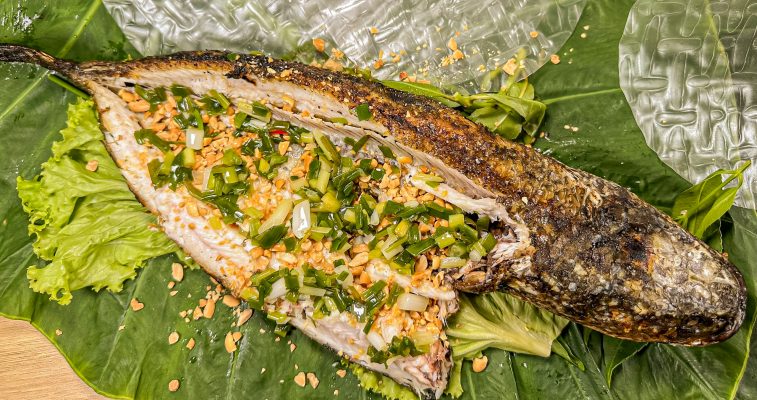 Grilled Snakehead Fish (Cá Lóc Nướng Trui): A rustic Vietnamese dish with smoky grilled snakehead fish, offering bold flavors and tender, chewy meat. Chuon Chuon Brand - powered by US Trading wholesale Asian Food distributor